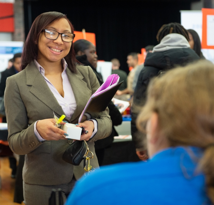 Student wearing business suit at job fair