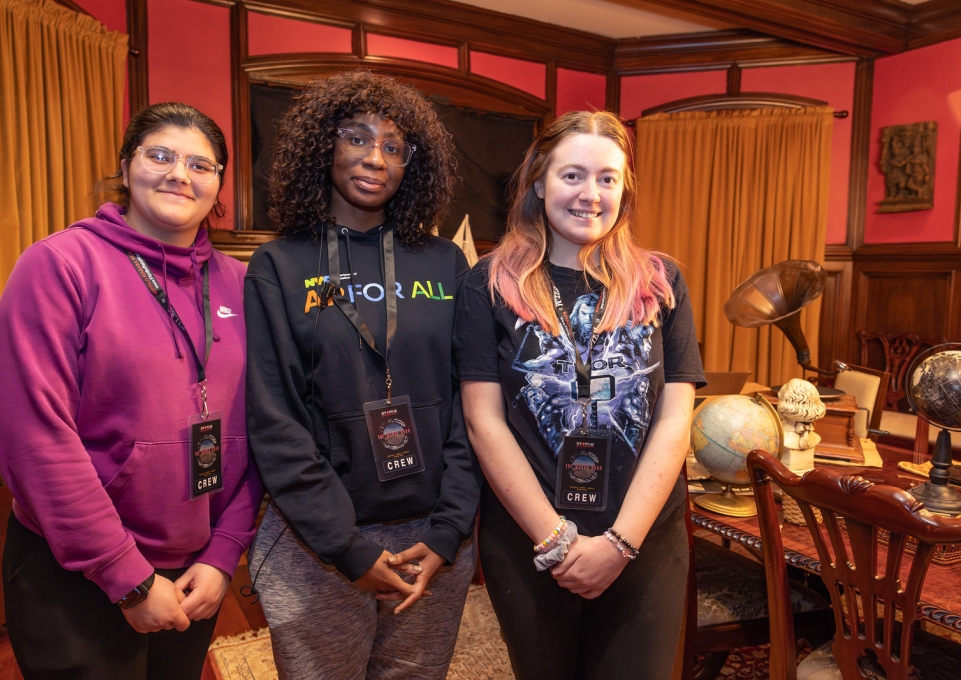 Three female students on film set of The Wrong Road